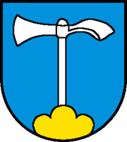Wappen Gemeinde Ruettenen blauer Hintergrund mit Hammer